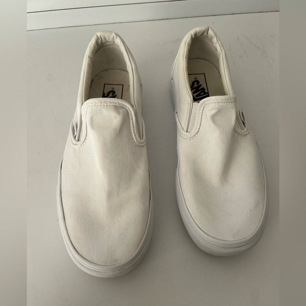 Vans white platform slip ons